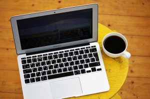 laptop and cup of coffee
